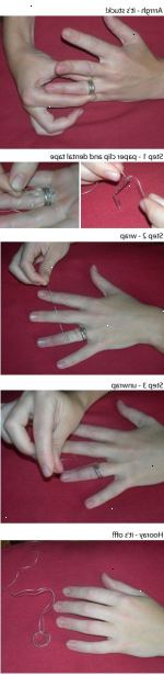 Sådan fjerner du en stak ring. Placer din pegefinger forsigtigt på fast ring, og tommelfinger under.